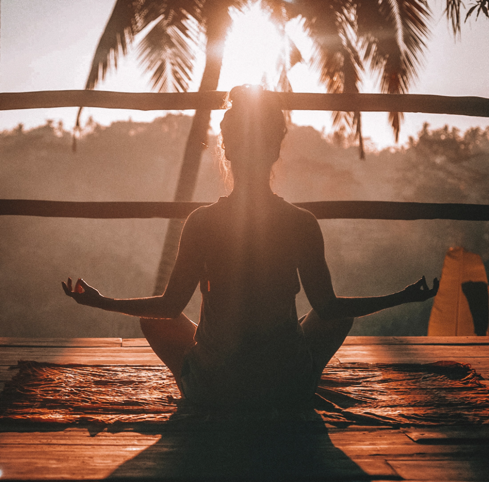 Woman meditating in the sun